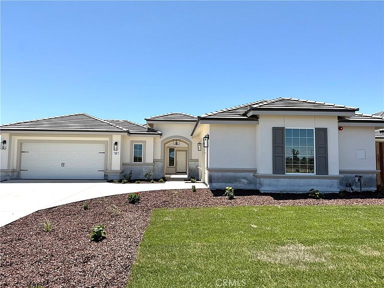 Aspenwood new construction home with stone accents in Atwater